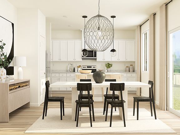 The dining room is open to the kitchen and family room.