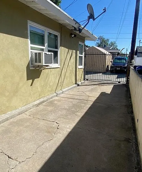 Private parking space(s) accessed through alley. With security gate.