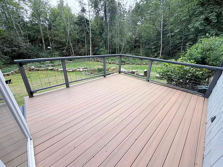 The large, level backyard is ideal for summer BBQs and outdoor entertaining.