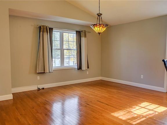 The dining area is large enough for a full dining table and chairs.