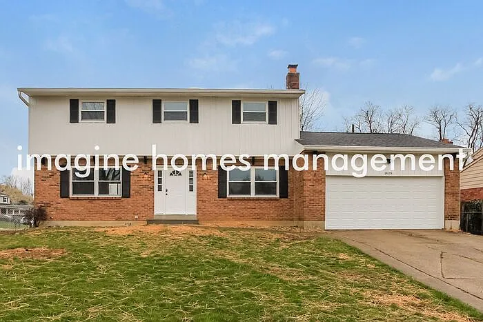 1409 Hilltree Dr — Photo 1