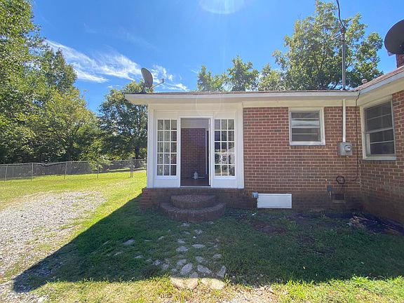 drive way side , porch and house entrance door to walk in to kitchen and laundry utility room.( left side of the house)
can