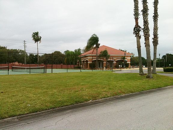 clubhouse with tennis courts