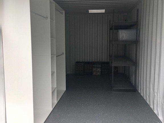 storage unit with modular closet and laundry