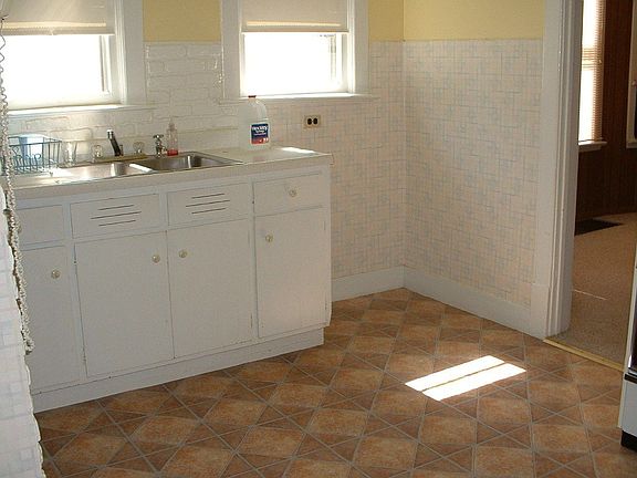 New floor in Kitchen, Pantry & Back Porch
