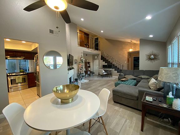 Dining room looking to living room and kitchen