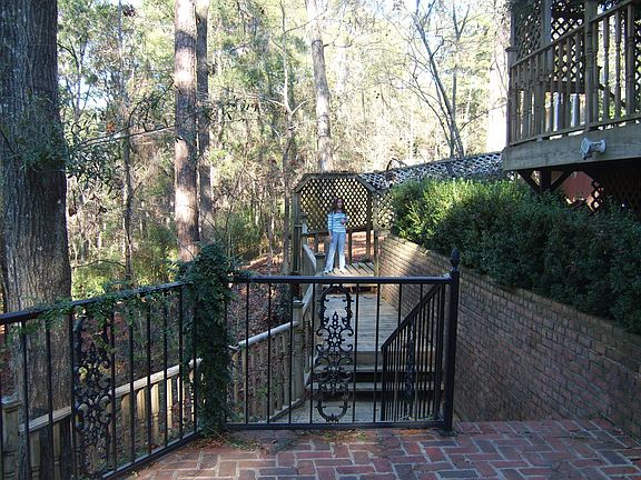 part of dowstairs brick patio (1200 sq ft)