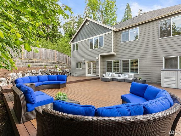 Massive ~820 sf Trex composite deck. West facing yard filled with afternoon sunshine! 