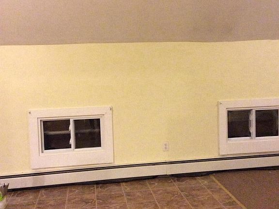 Kitchen windows are low/ sloped ceiling