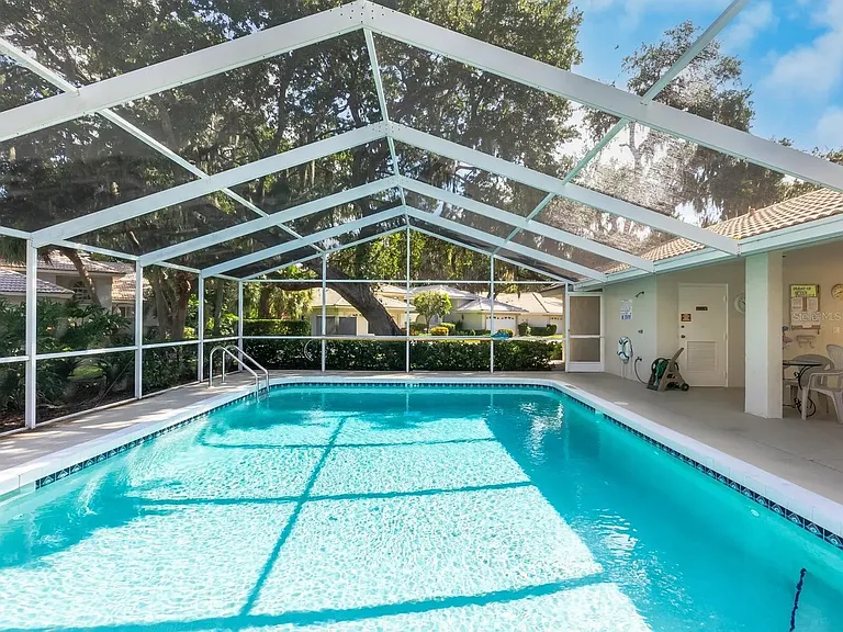 7042 Woodside Oaks Cir — Photo 28
