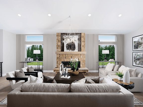 The Osprey floor plan offers a spacious, open layout with expansive views that fill the home with na