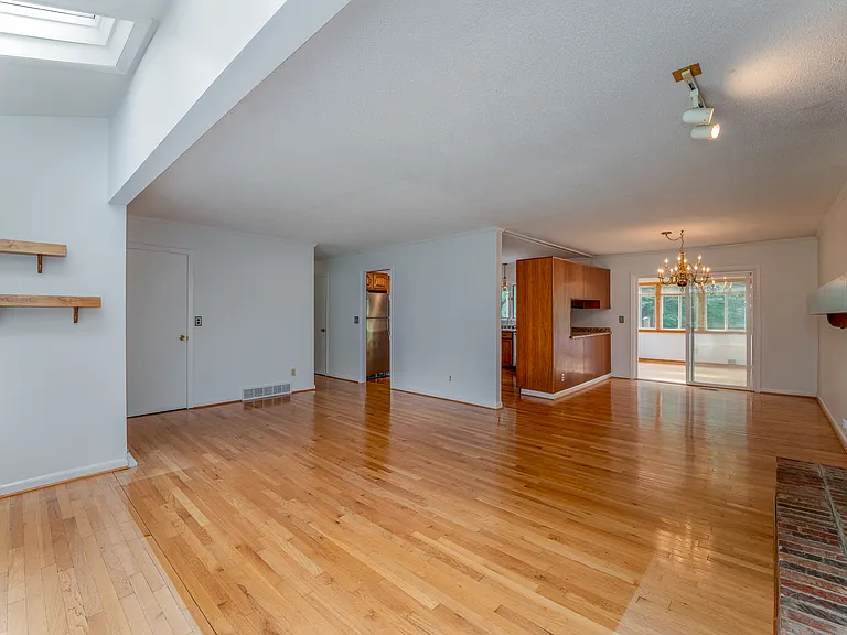 Living Area into Dining, Kitchen, and Sunroom