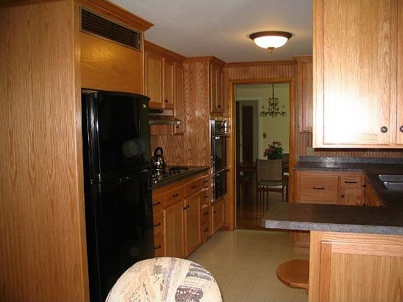 kitchen from eating area to diningrm