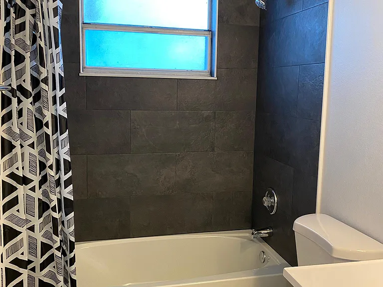 second bathroom with all new bathtub and countertop