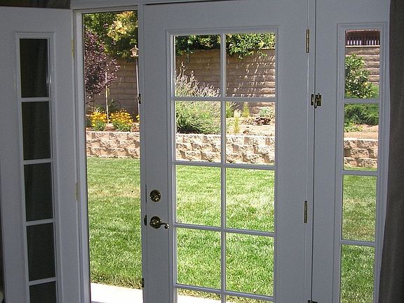 View from Master Bedroom, to Backyard Area, through French Doors