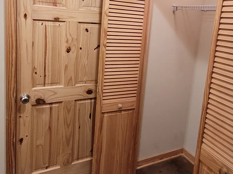 From the garage, you enter the mudroom/ laundry room, and can store coats in the closet, before entering through kitchen door.
