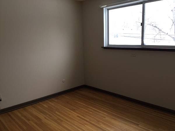 Bedroom 1 with hardwood flrs