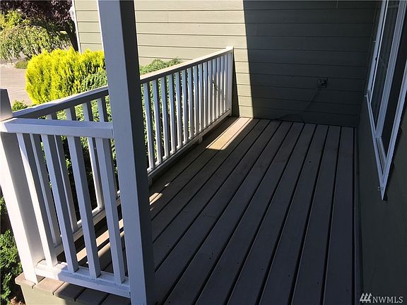 Covered front porch with easy care composite decking