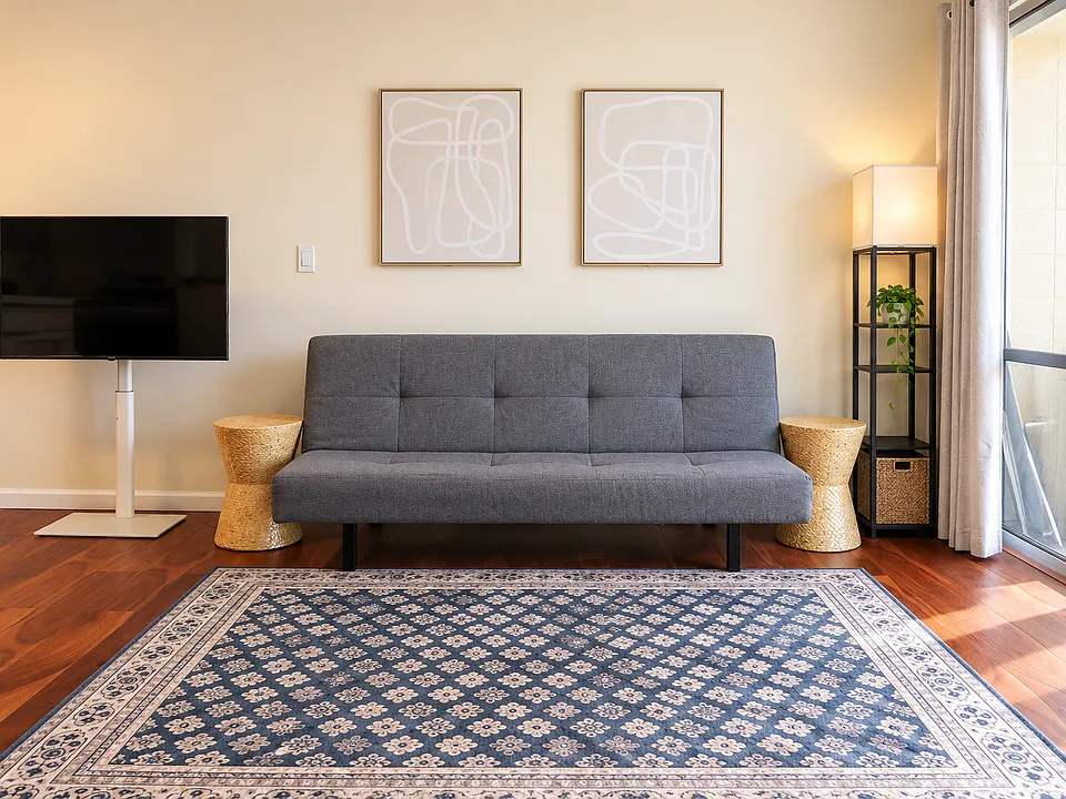 Spacious Living room with sofa sleeper, TV and city /mountain views