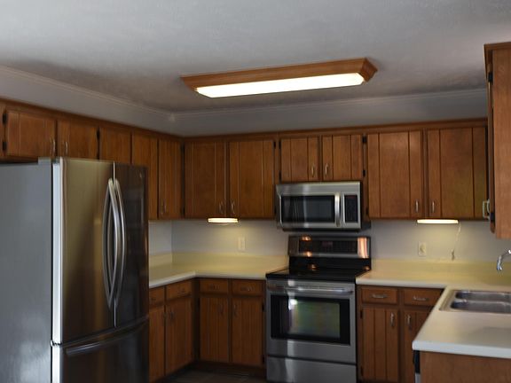 Stainless steel appliances in the kitchen.