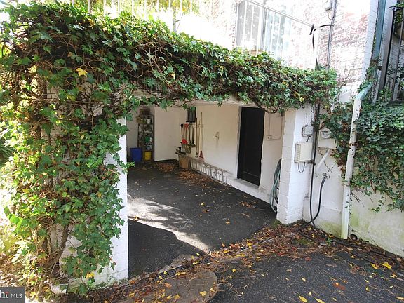 Single car covered parking and storage, second non-covered parking space on site