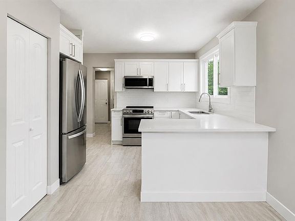 5th image of 115 Abingdon Cres NE