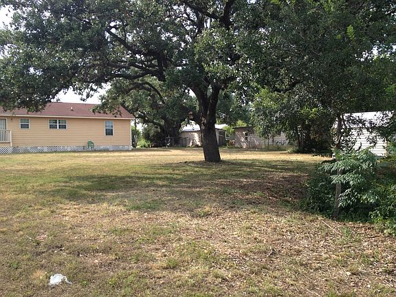 back yard with storage shed
