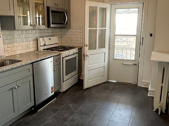 Kitchen with access to the porch and back stairs