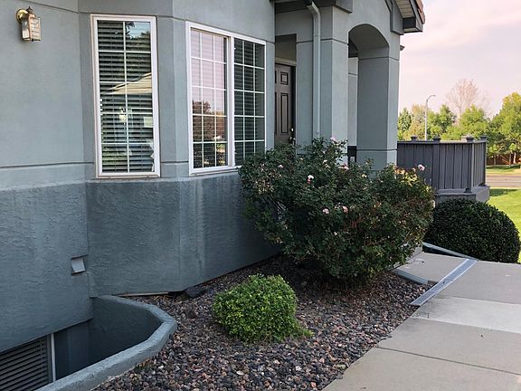 Exterior view toward entry; view of Bay Window in Office