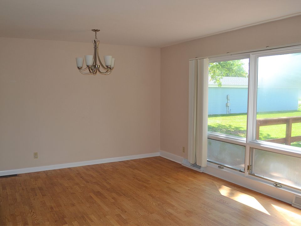 Dining area just off the kitchen and combined with living room. Huge windows!