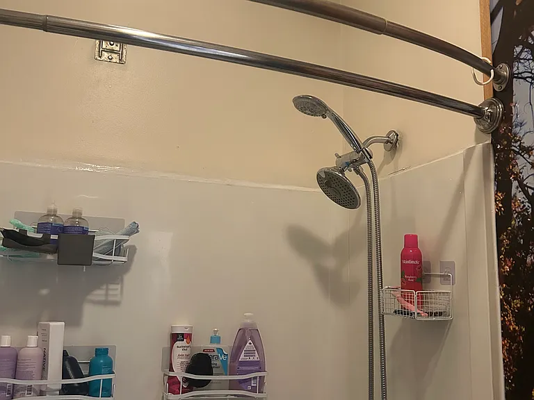 New rainfall shower head with massaging feature (leave mounted, or. handheld). 2025.06