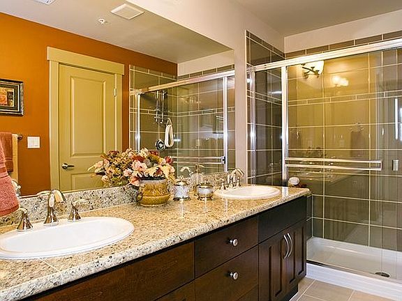 Granite, marble and tile in both master baths