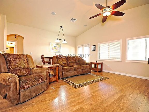 Spacious Great Room with wood laminate flooring.