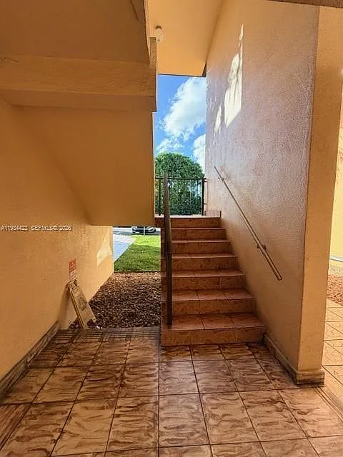 Building Photo - 8990 SW 24th St #215