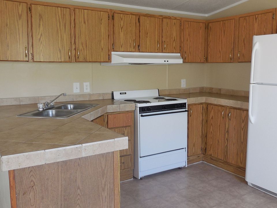 Beautiful counter tops and a flat top stove