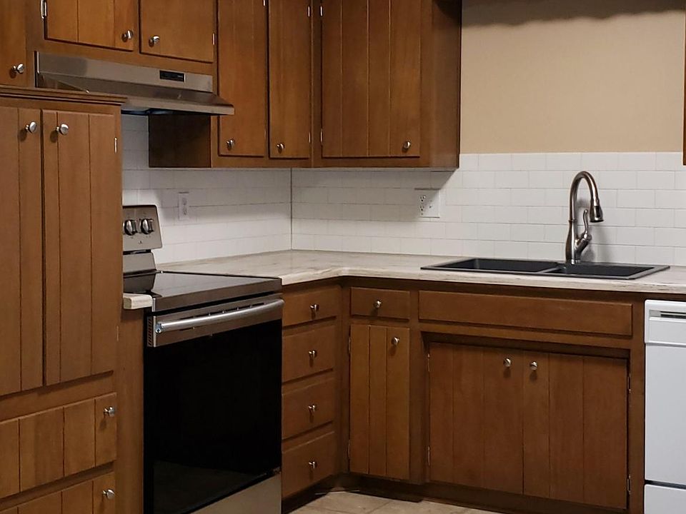 Kitchen with New Counter tops, Glass top Range and Faucet