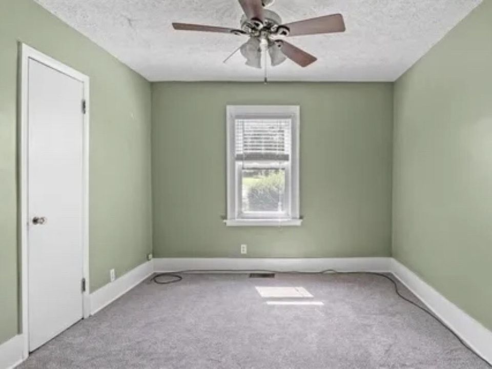 Bedroom 1 off of dining room.