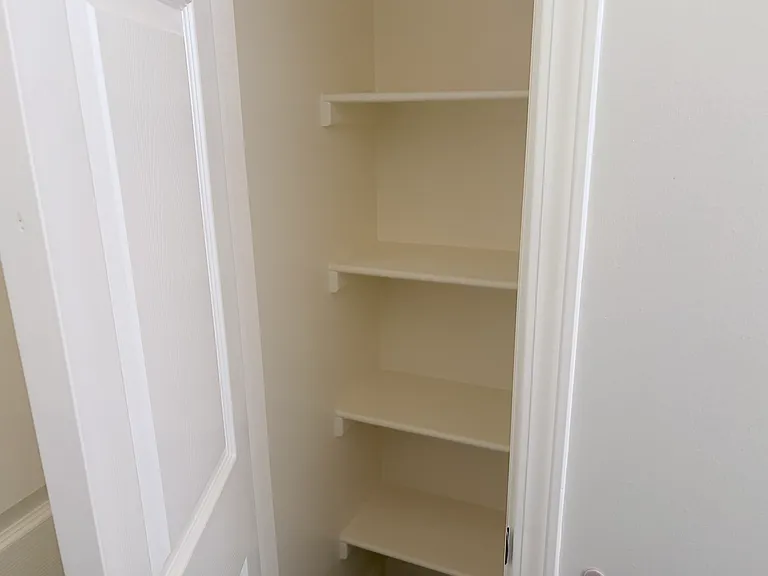 Closet in guest bathroom