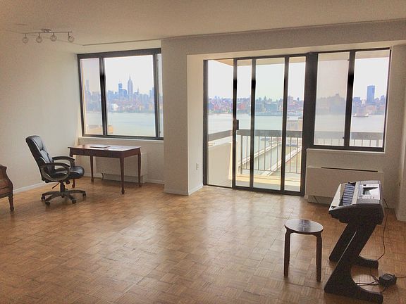 Living room opens to balcony