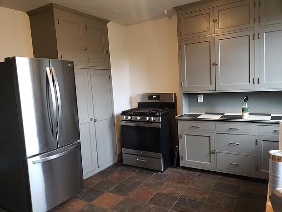 Stainless steel appliances; gas range.