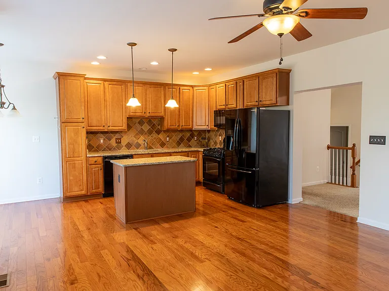 Kitchen along second seating area