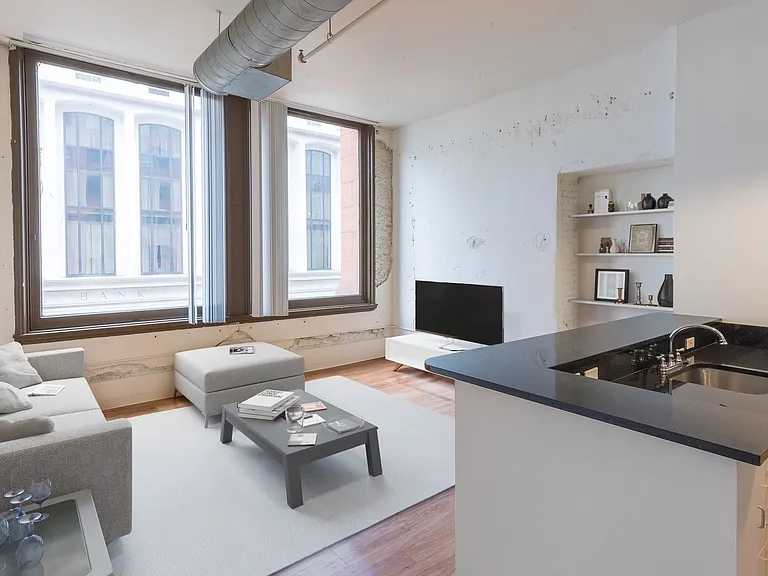 Kitchen opens up to the living room