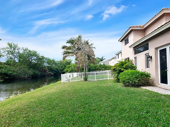 Back Yard looking west. For a video tour click this link: https://youtu.be/r3iJ5wg6Enc