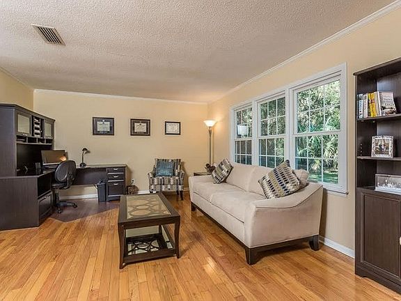 Formal Living Room : Open Flow from Formal Living Room to Dining Room to Den. New Windows.