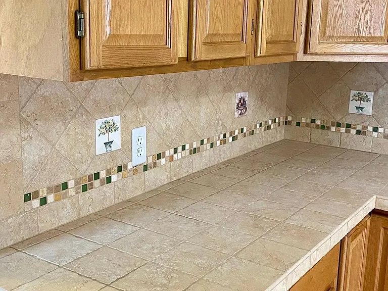 Tile countertops and backsplash.