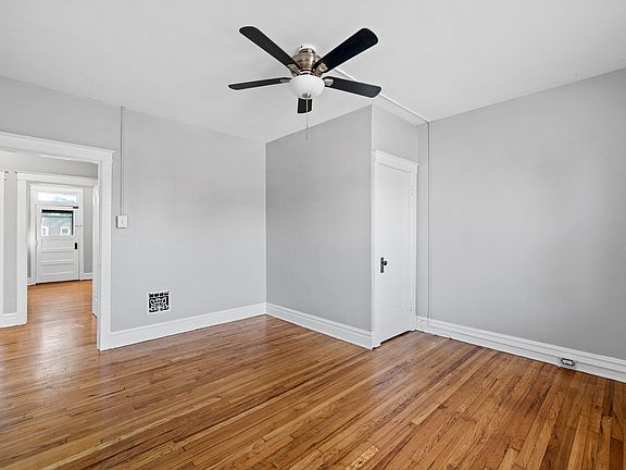 Living Room with view of Primary Bedroom
