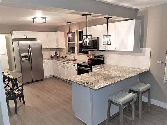 4th image of 8726 N Highland Ave