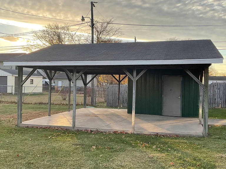 HUGE Covered porch/patio in backyard. Great for grilling out or spending time outdoors