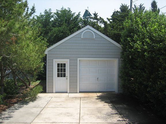 garage located behind house