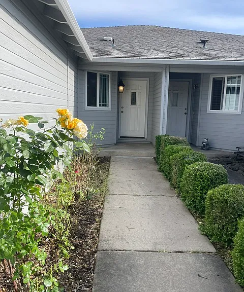 Entry; 
Note: There is a single wall shared with a neighbor.